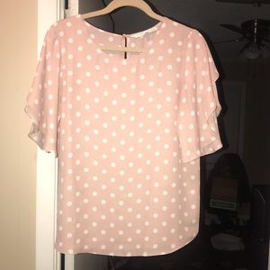 Pink and white polka dot top